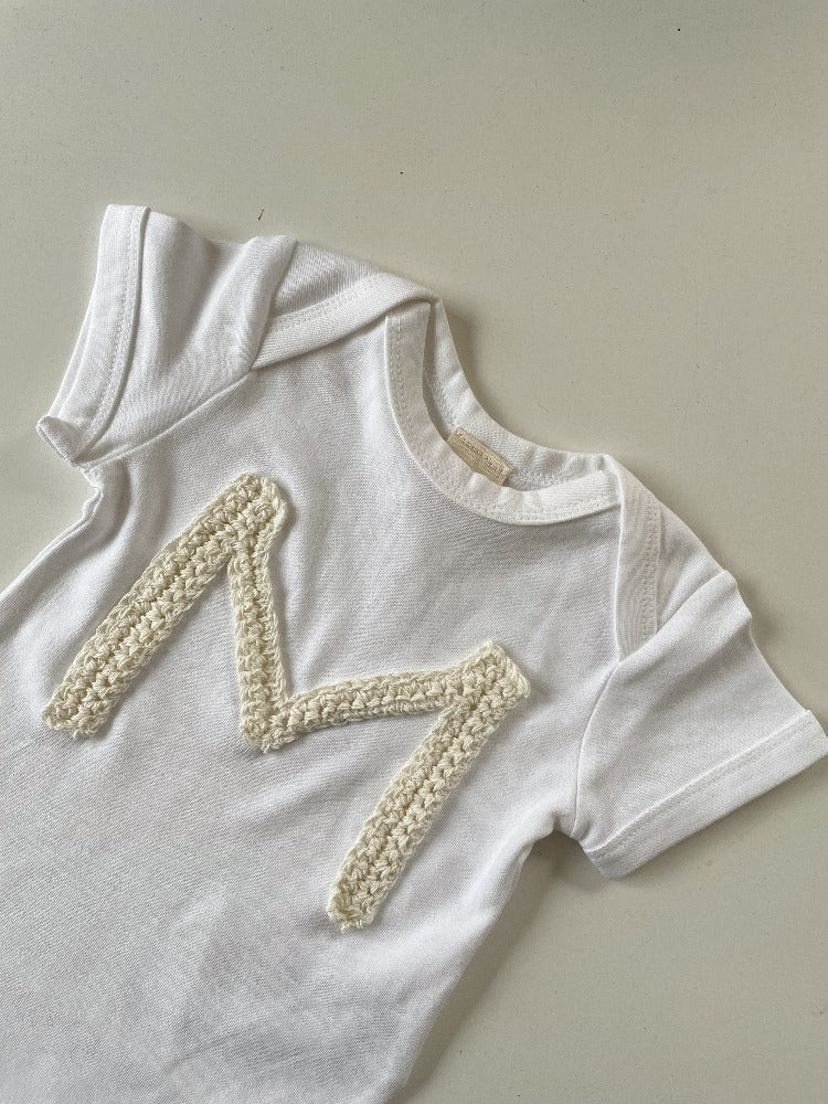 Initial appliqué organic cotton vest